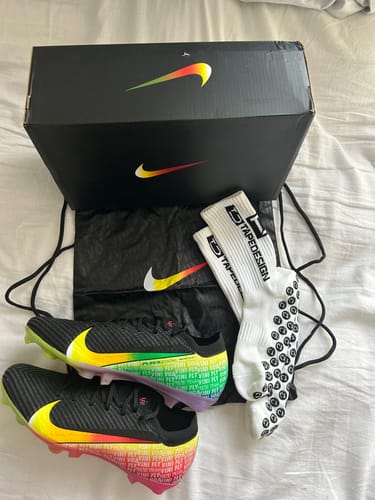 Customer's Nike Mercurial Vapor 16 SG, black and orange shoes with a matching Nike box and white grip socks.
