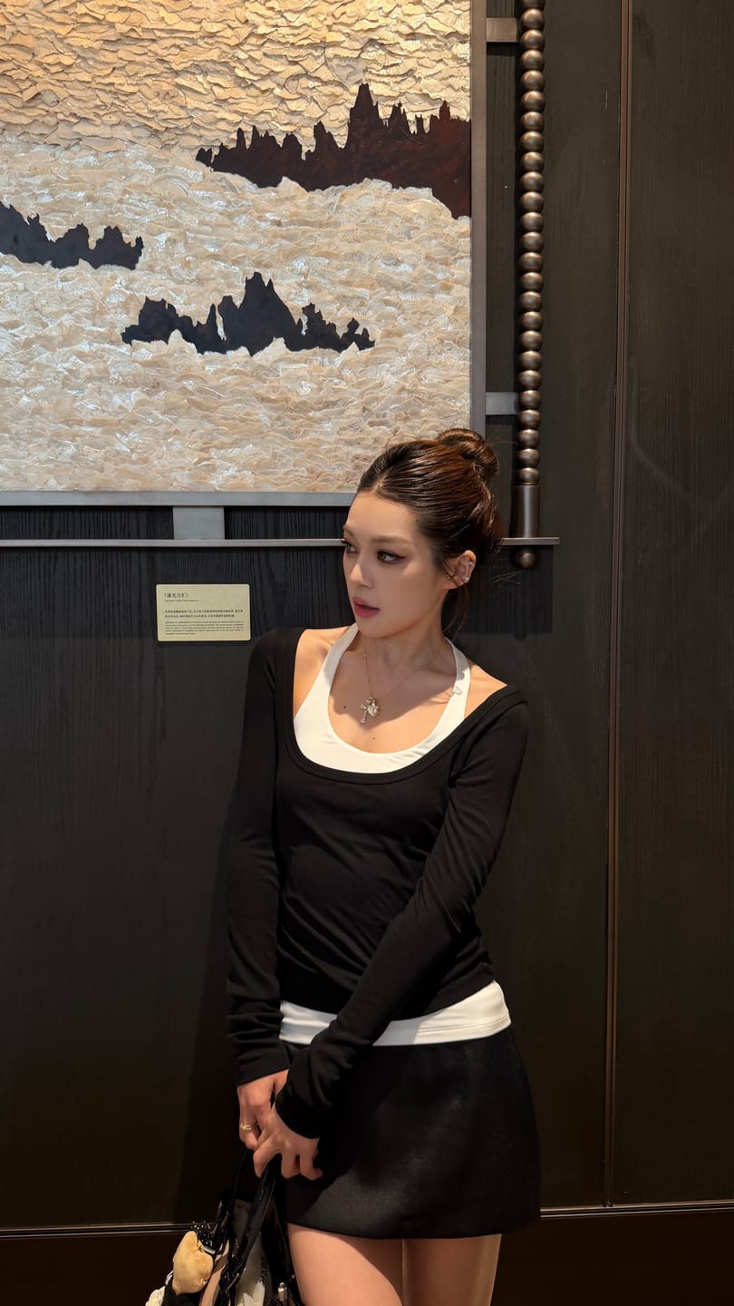 Customer photo review of ROVENTE Layered Long Sleeve Top & Fitted Mini Skirt Two-Piece Set