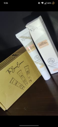 Customer's Advance Lip Pigmentation Cream in its white tube and matching box packaging on a dark surface.
