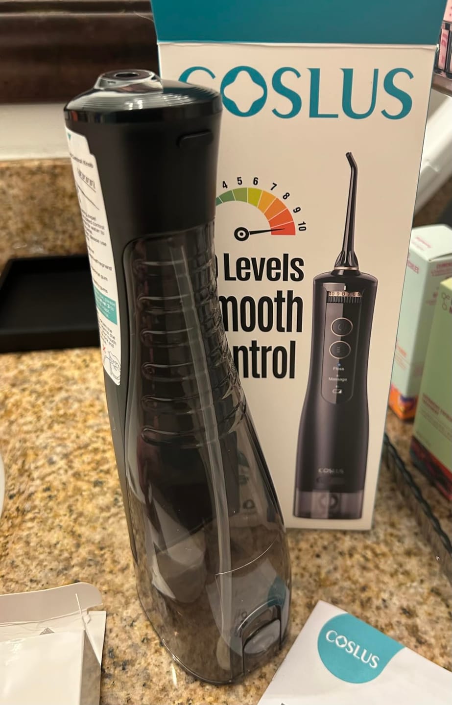 Customer photo review of COSLUS E40 10-Level Dial Pressure Control Water Flosser