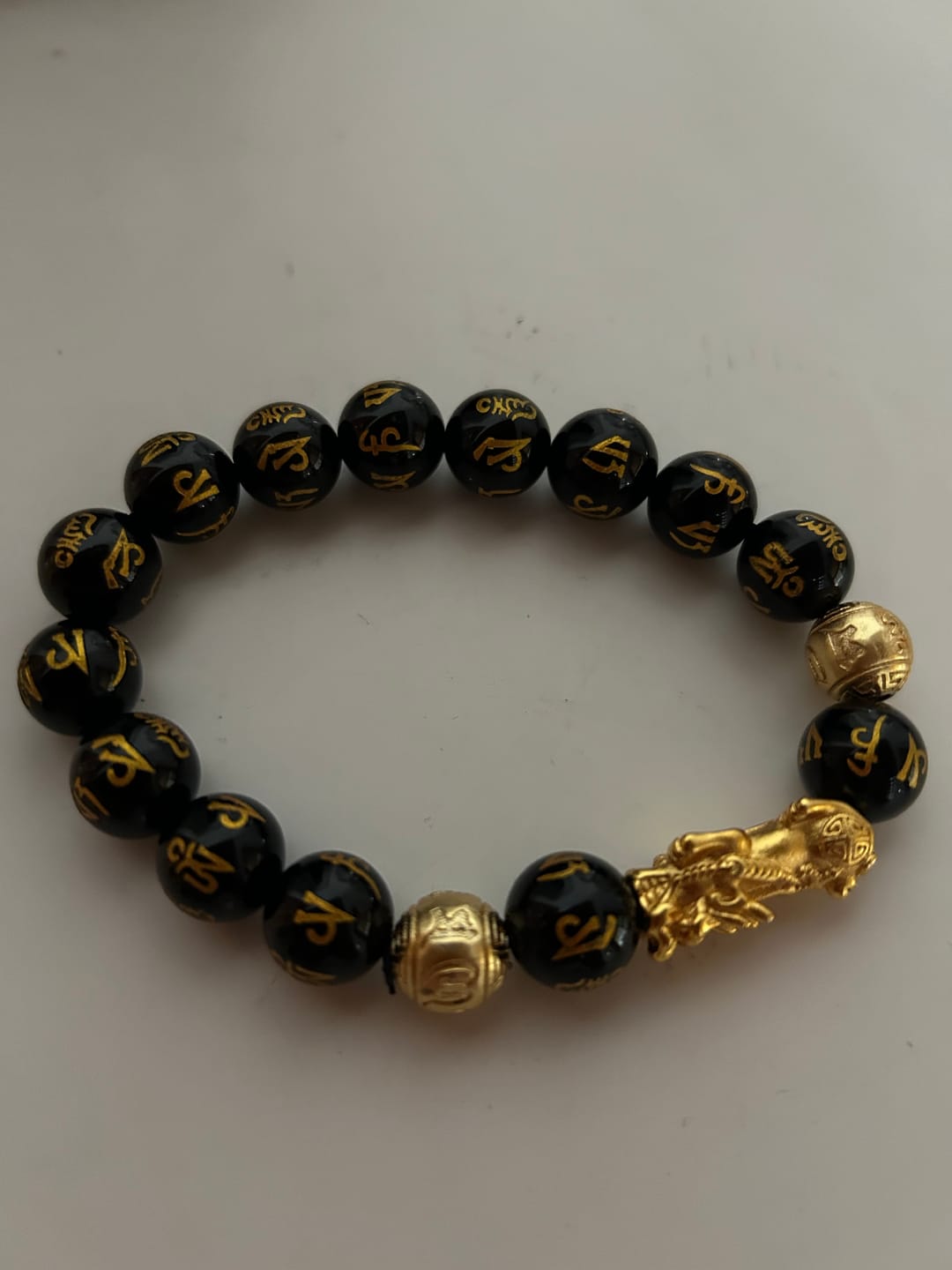 Customer photo review of Buddha Stones Reichtumsarmband mit Obsidian und schwarzem Turmalin in Goldglanz