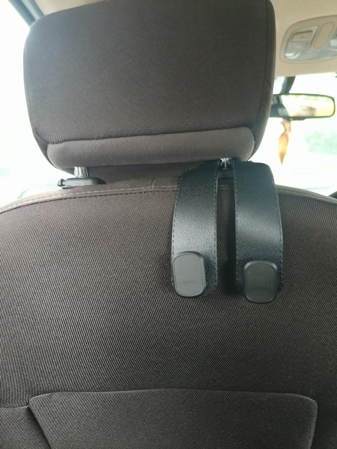 Customer photo review of Car Headrest Hook - Pack Of 2