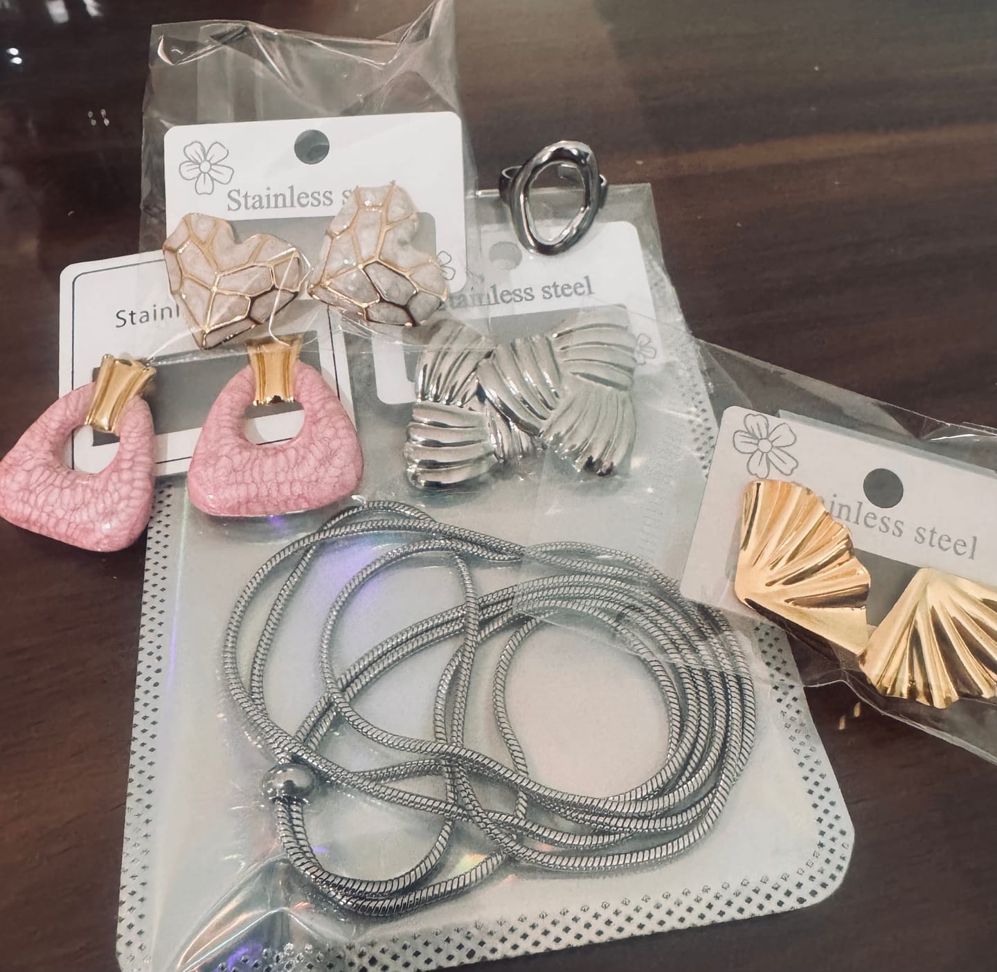 Customer photo review of Aretes acero inoxidable - rosas