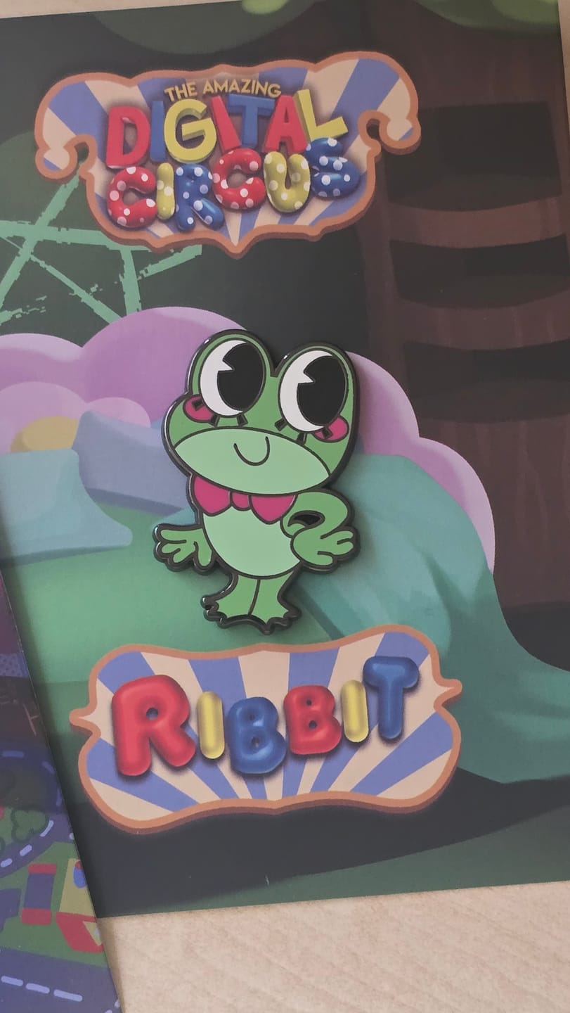 Customer photo review of Ribbit Enamel Pin
