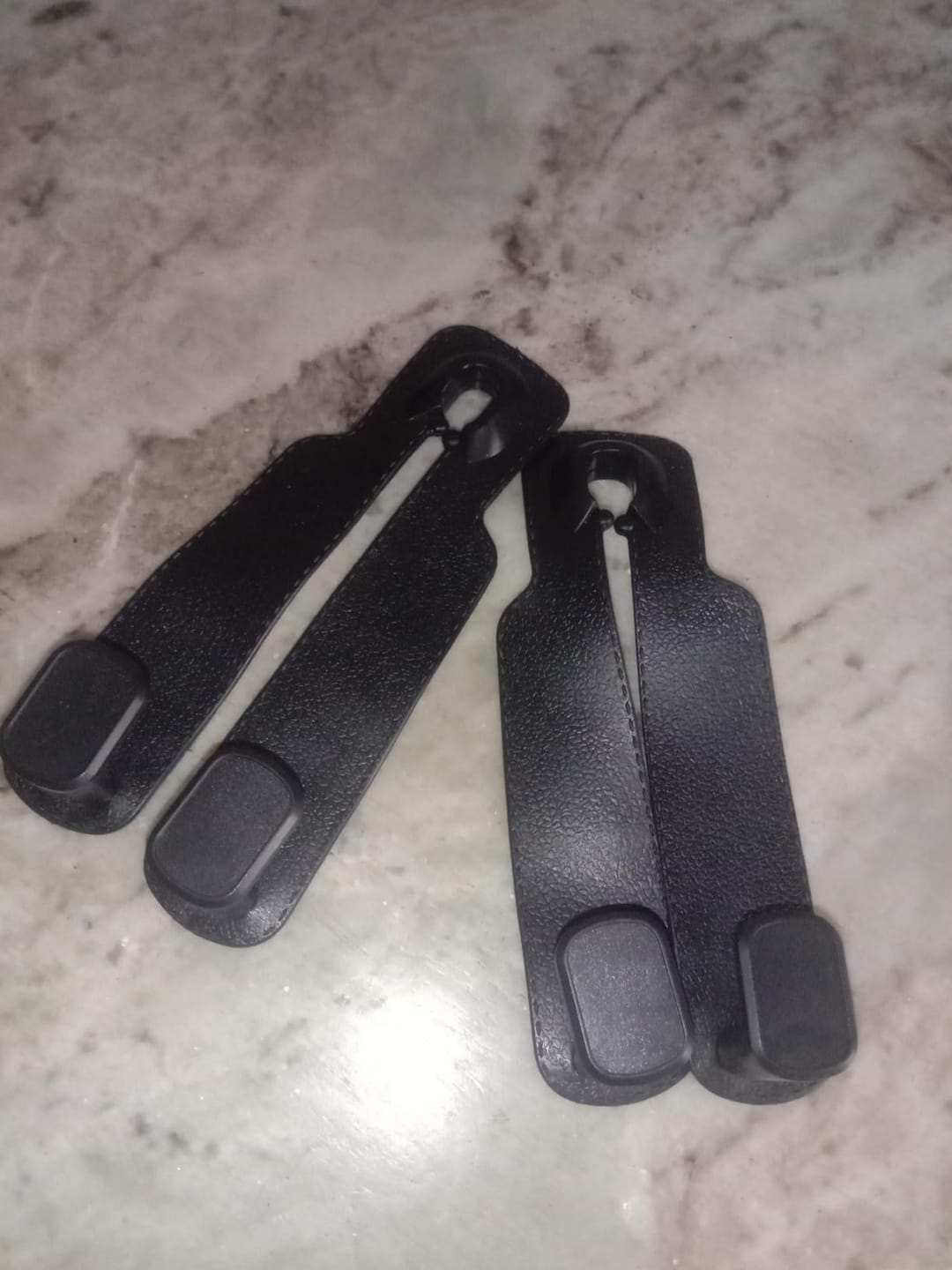 Customer photo review of Car Headrest Hook - Pack Of 2