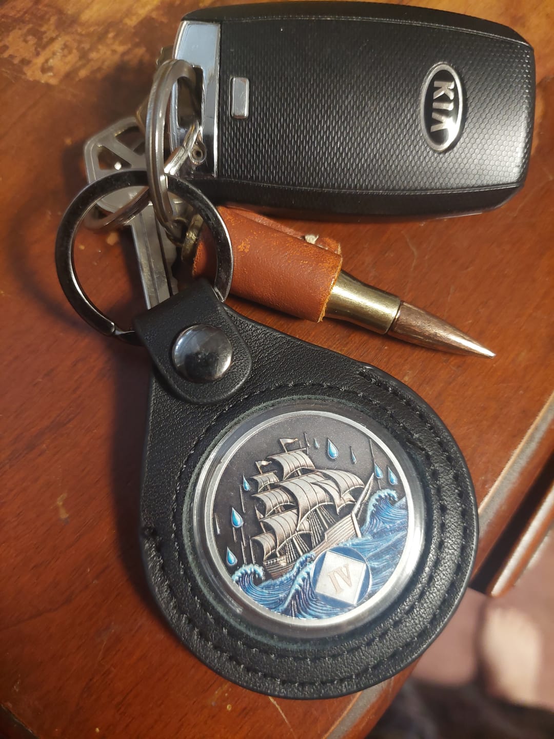 Customer photo review of Sobriety Mint Genuine Leather 40mm AA Medallion Keychain Holder - Recovery Chip/Coin/Token Holder - Black