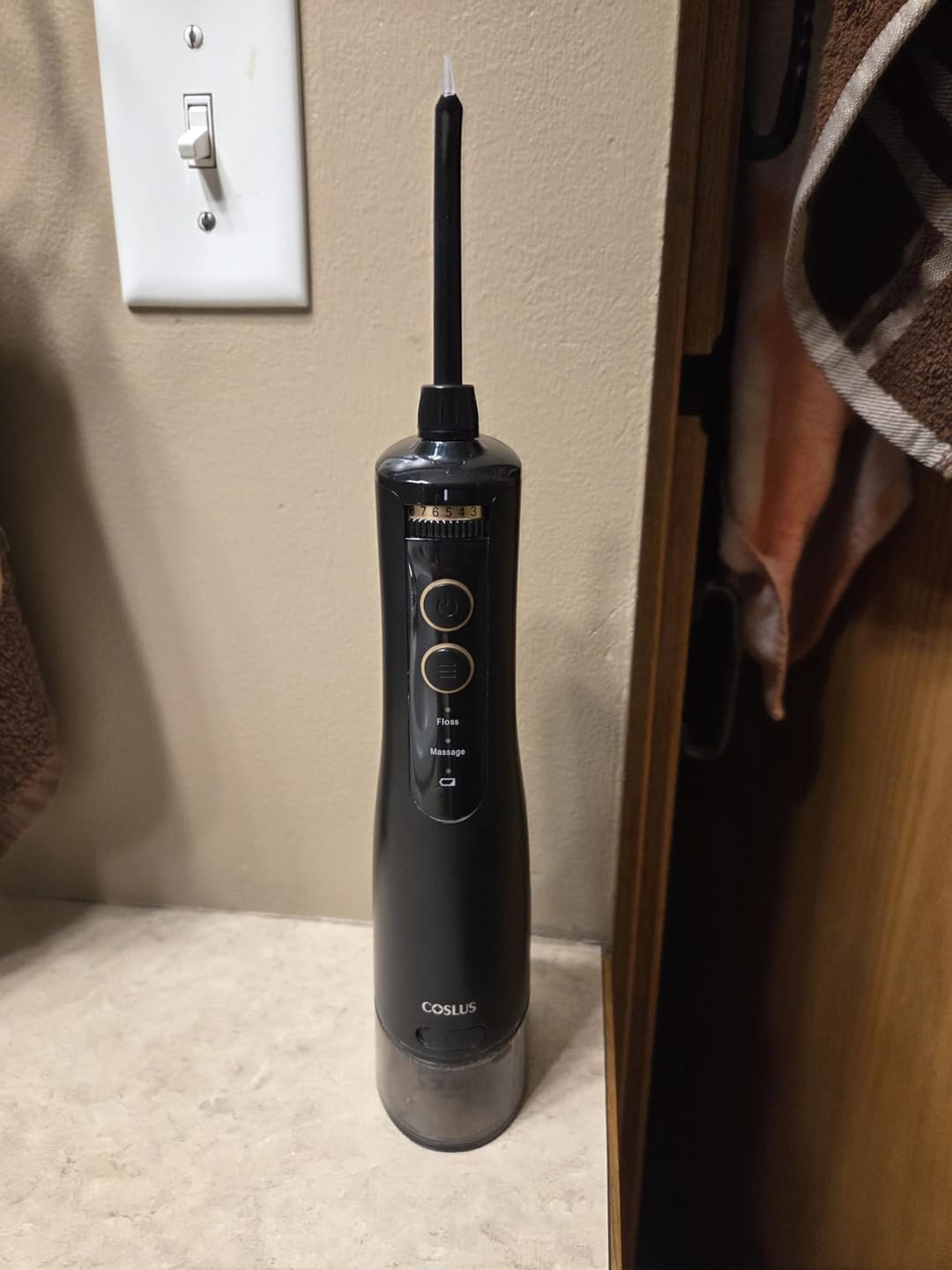 Customer photo review of COSLUS E40 10-Level Dial Pressure Control Water Flosser
