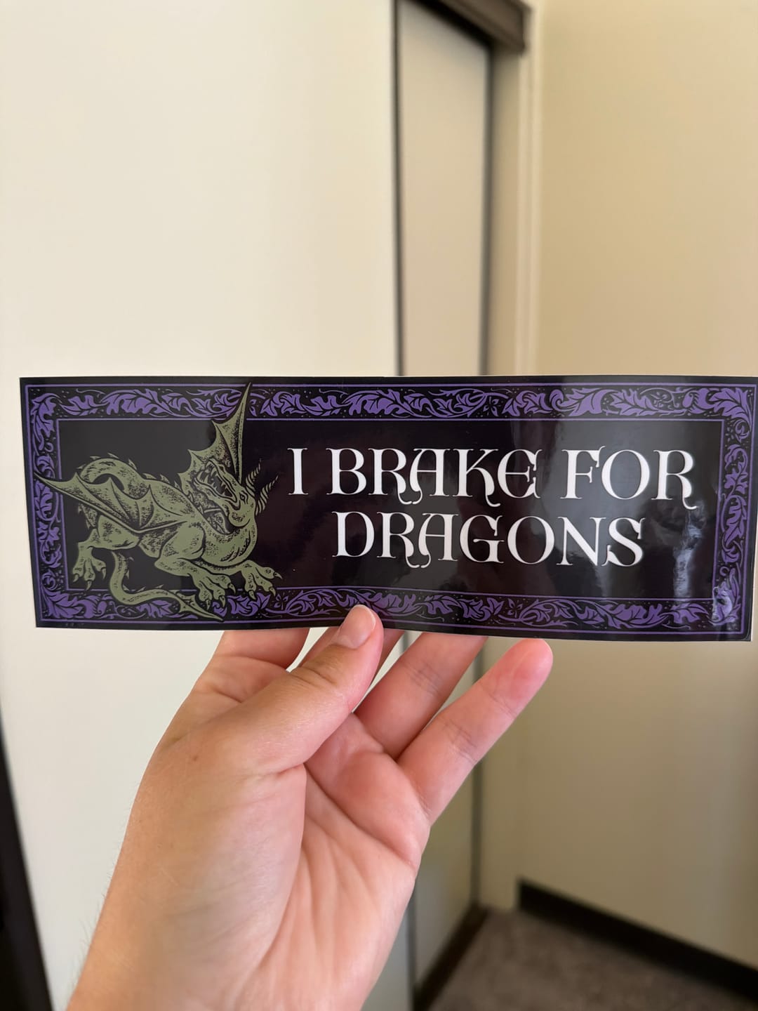 Customer photo review of I Brake for Dragons Bumper Sticker