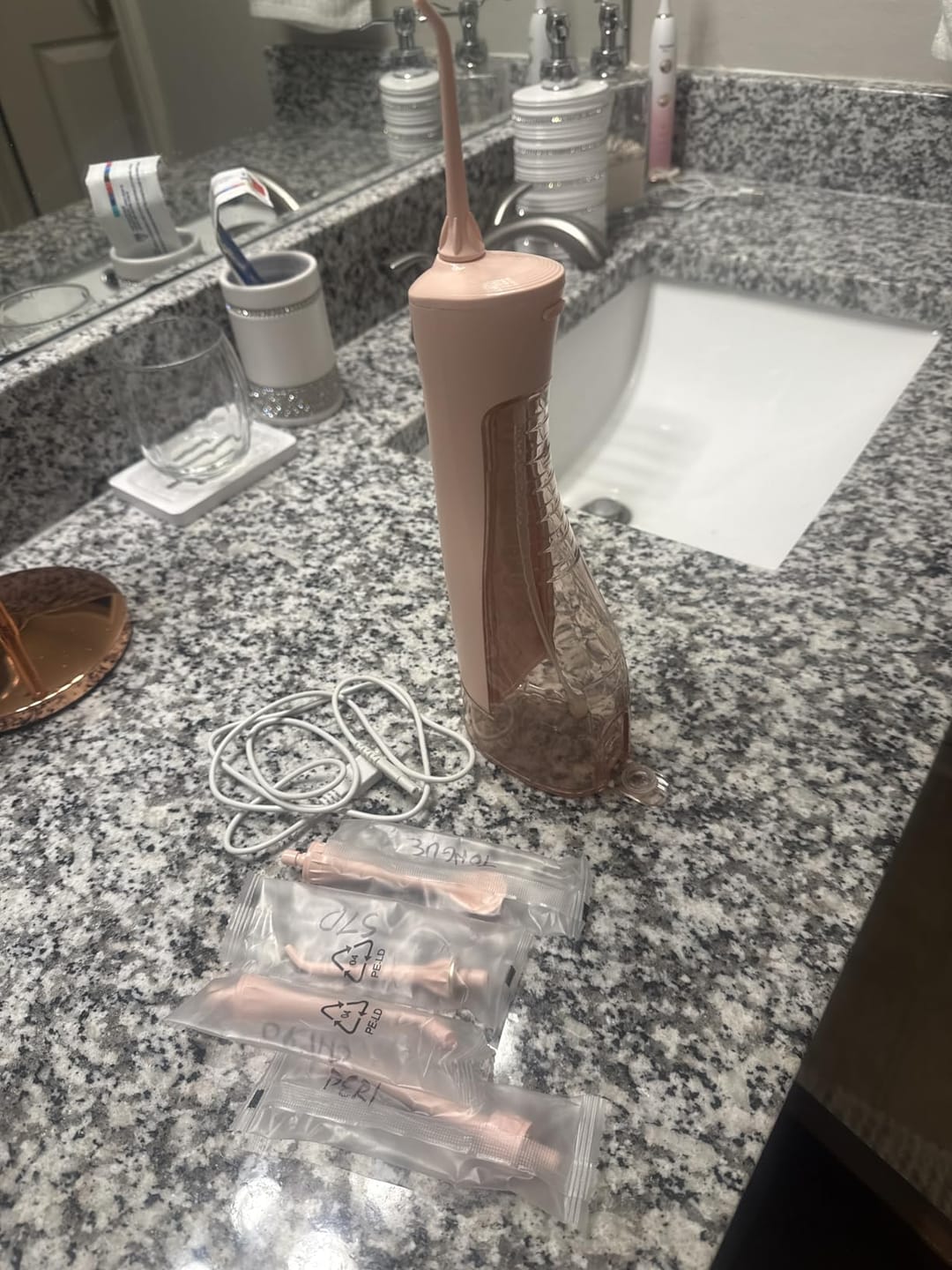 Customer photo review of COSLUS E40 10-Level Dial Pressure Control Water Flosser