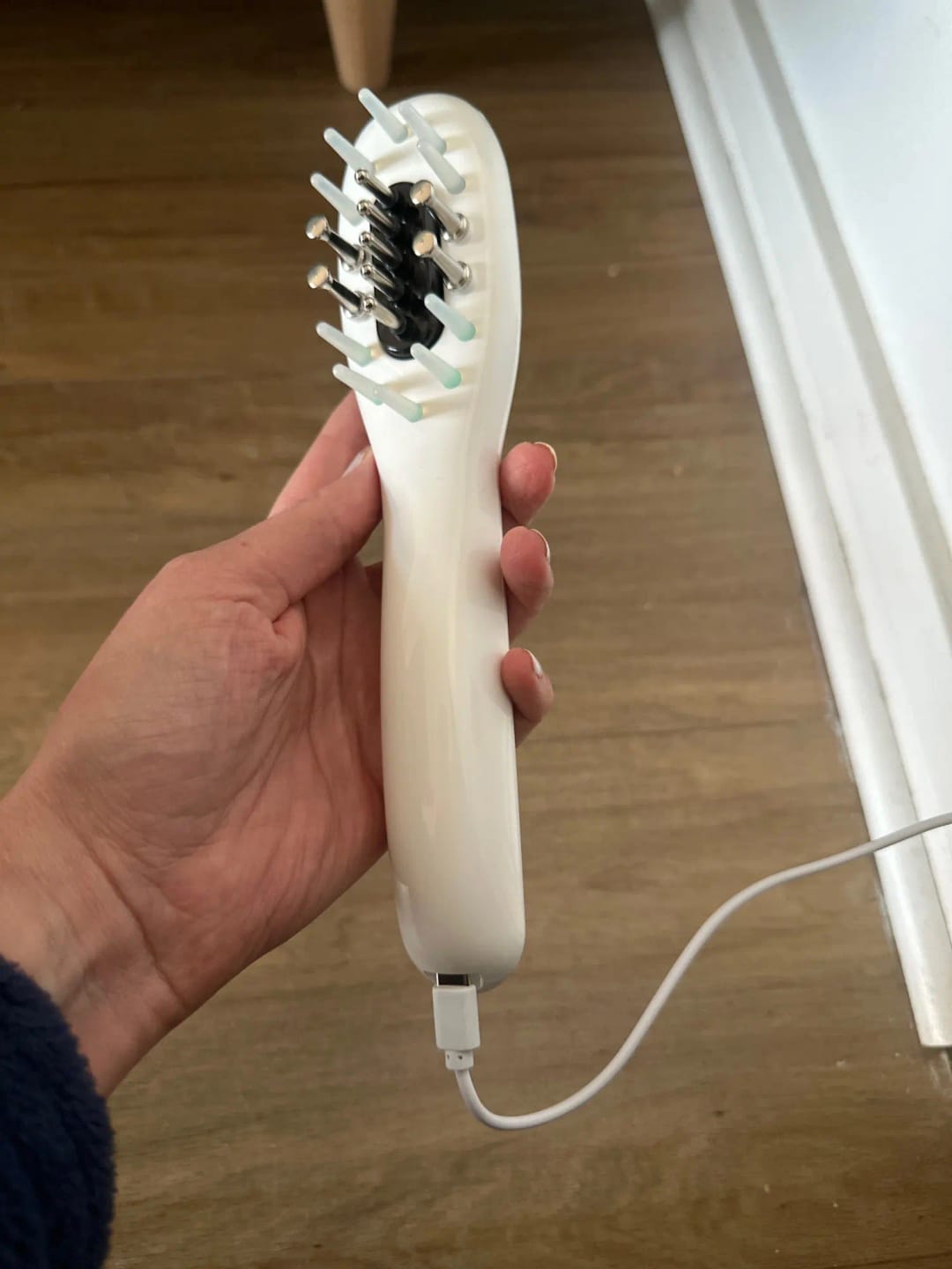 Customer photo review of Deluxe Electric Massage Comb with Oil Dispenser - Sonic Scalp Massager