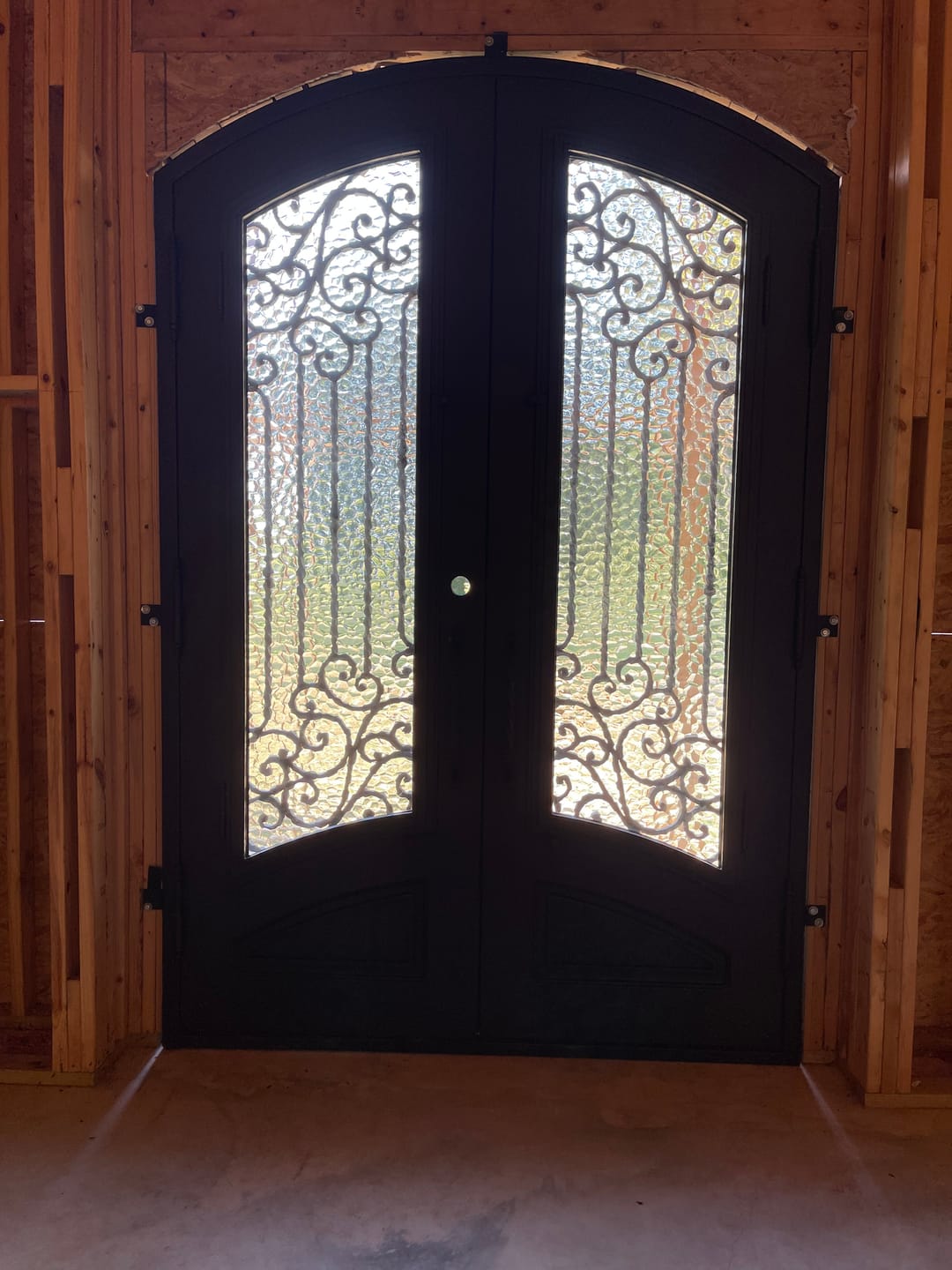 Customer photo review of Archer Model Double Front Entry Iron Door With Tempered Water Cubit Glass Dark Bronze Finish