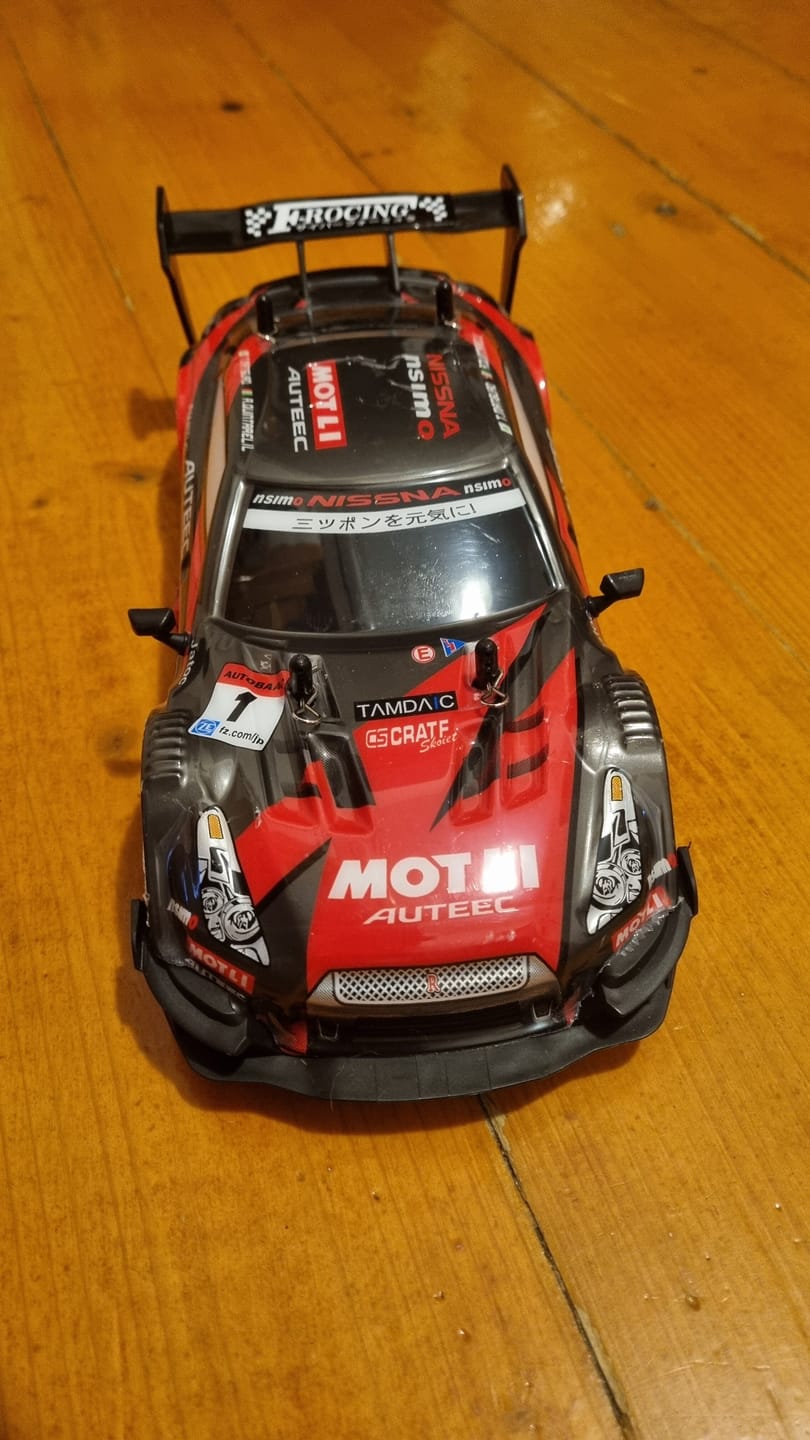 Customer photo review of Masina cu telecomanda RC Timebox, 30km/h, 1:16, 4x4, Drift car, Negru/Rosu