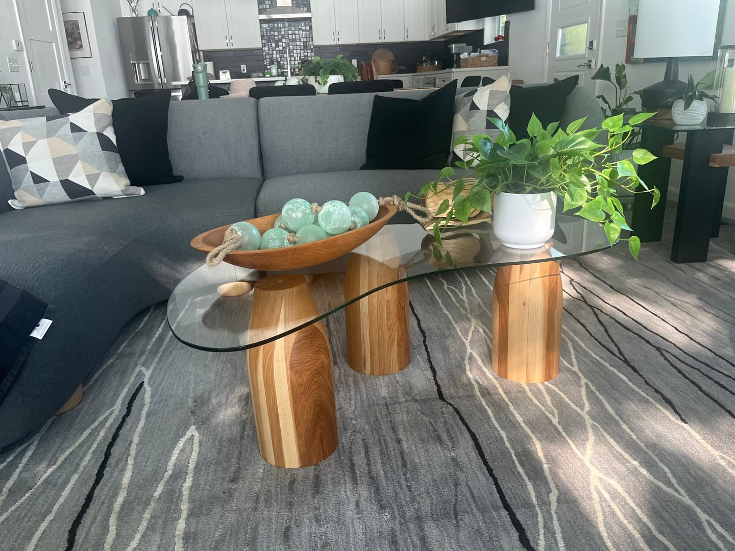 Customer photo review of Contemporary Glass Coffee Table With Wooden Ball Legs