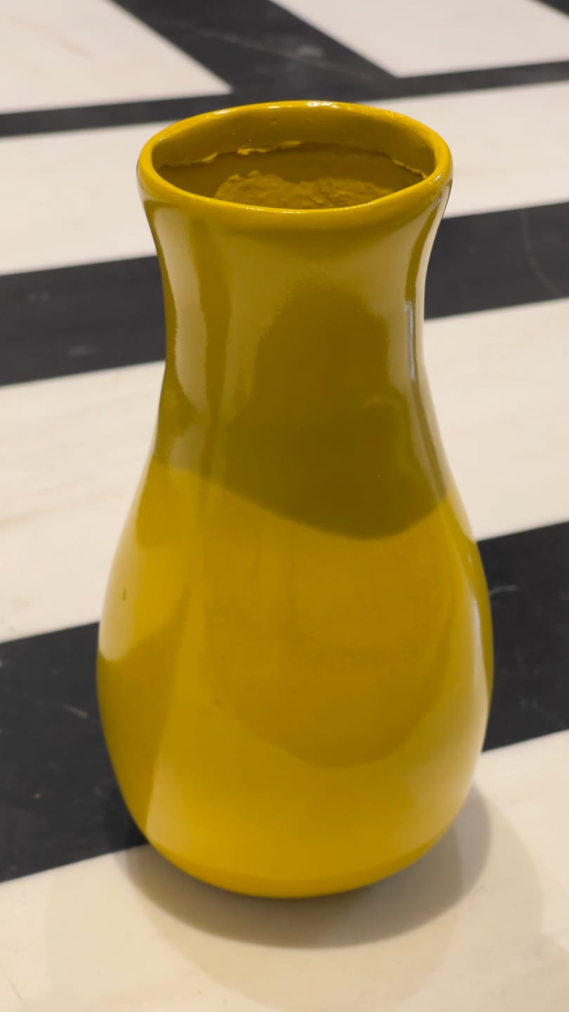 Customer photo review of Bright Yellow Decorative Resin Vase Sculpture Vastu Remedy for Positive Energy Balance and Interior Harmony for Living Room, Office and Home Decor | 6.3 x 20 cm | 230 gm