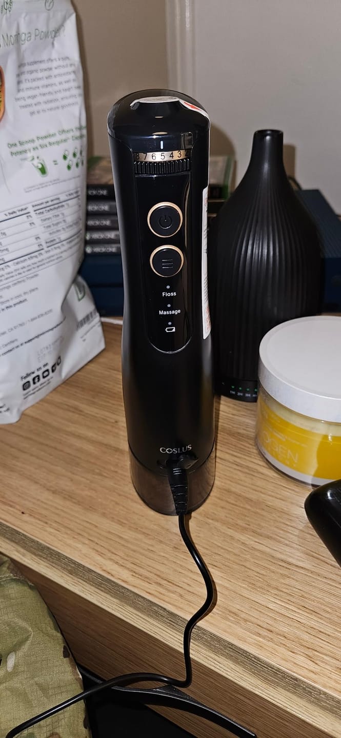 Customer photo review of COSLUS E40 10-Level Dial Pressure Control Water Flosser