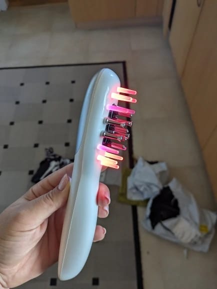 Customer photo review of Deluxe Electric Massage Comb with Oil Dispenser - Sonic Scalp Massager