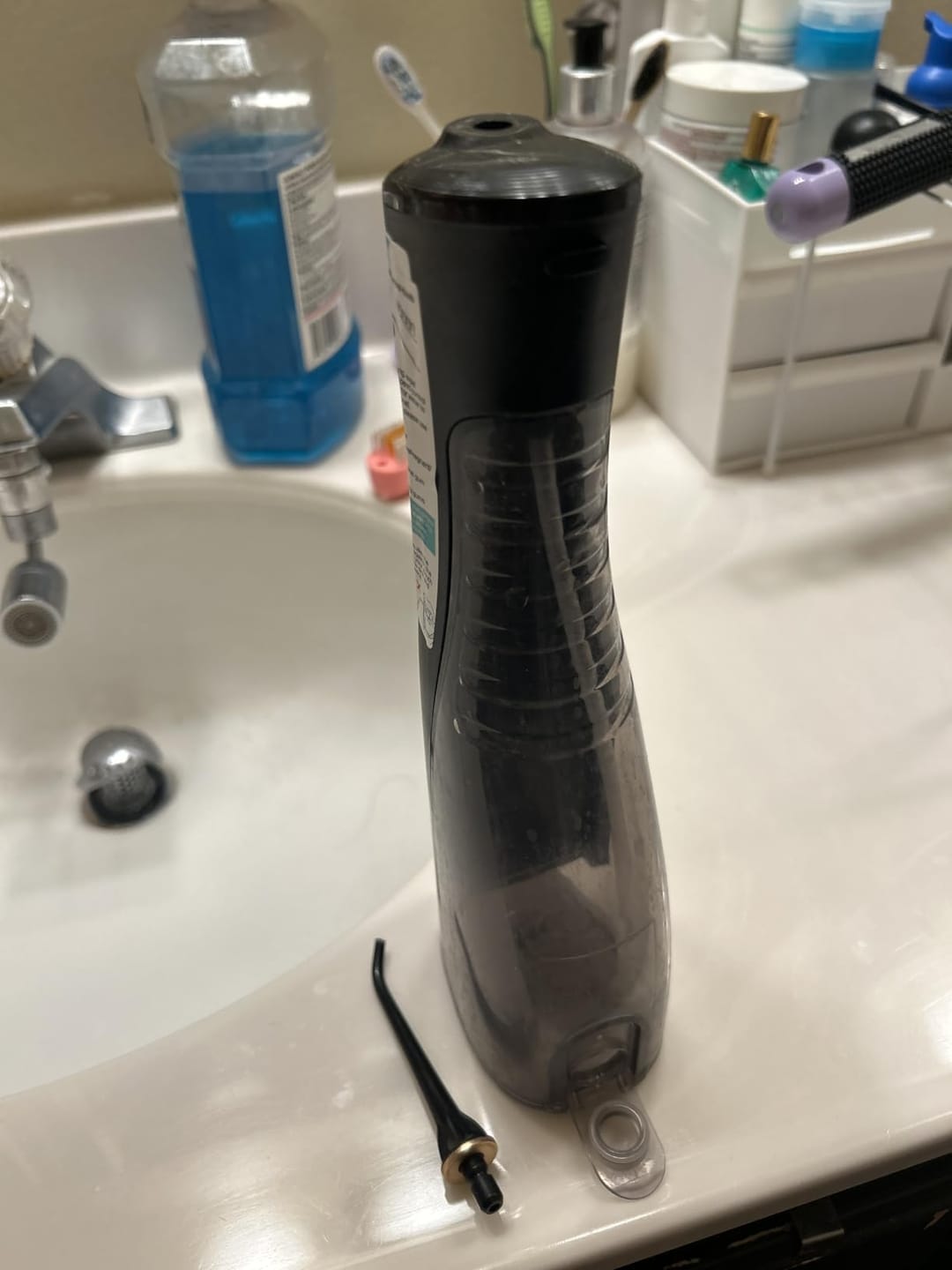 Customer photo review of COSLUS E40 10-Level Dial Pressure Control Water Flosser