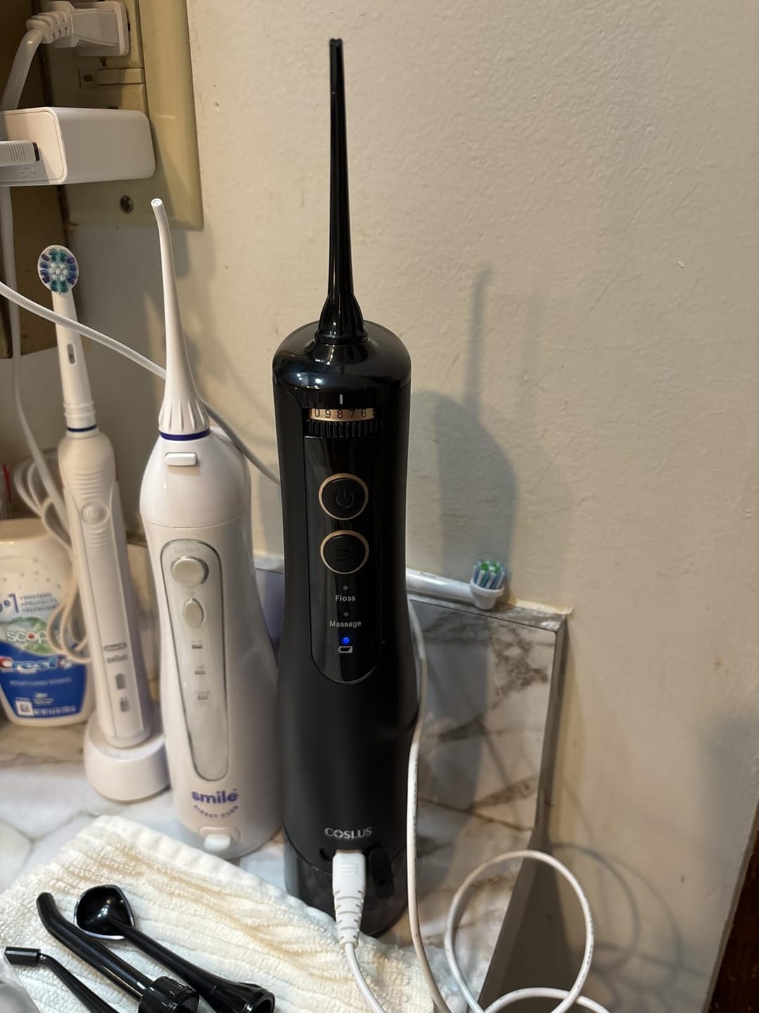 Customer photo review of COSLUS E40 10-Level Dial Pressure Control Water Flosser