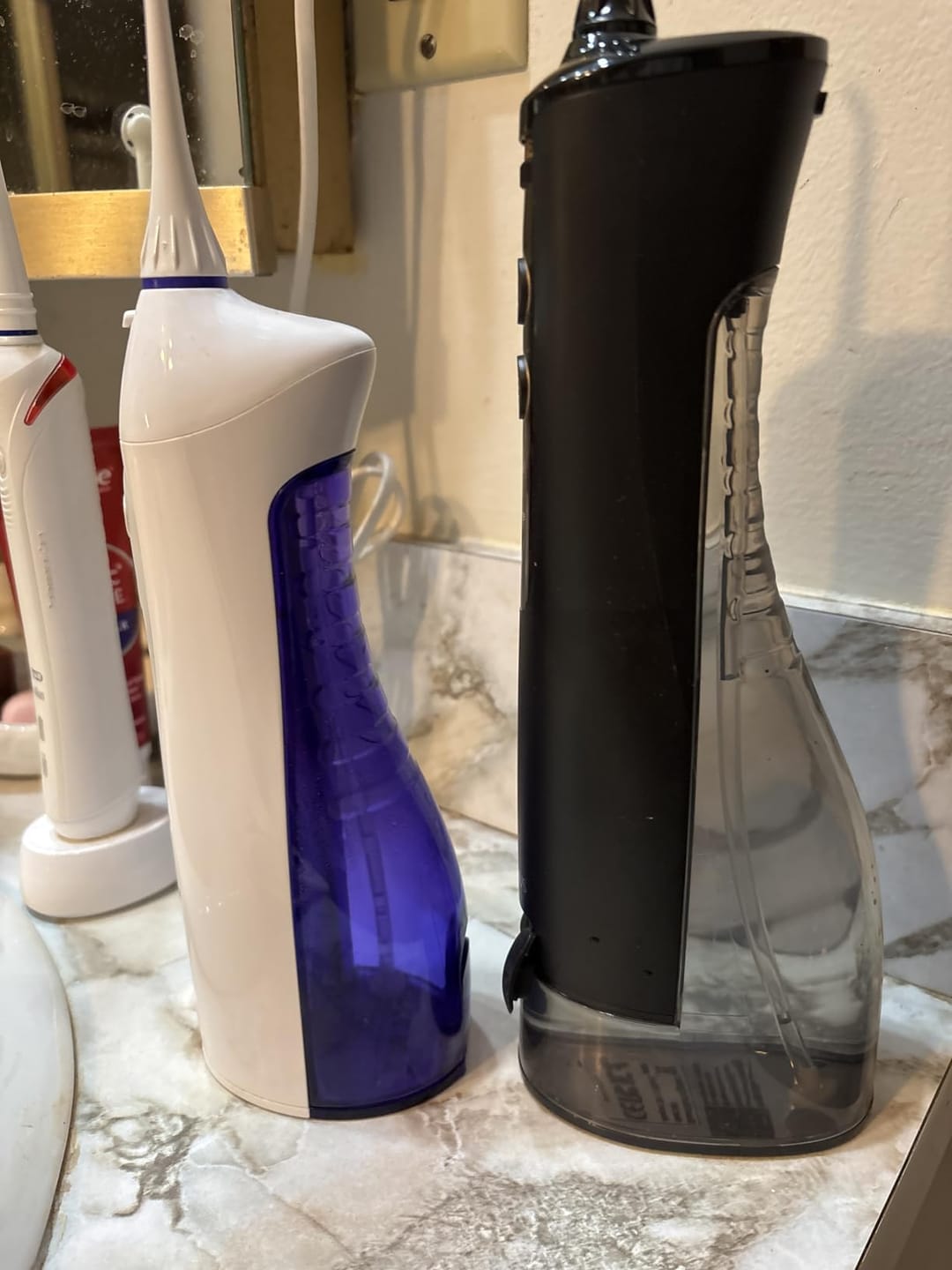 Customer photo review of COSLUS E40 10-Level Dial Pressure Control Water Flosser