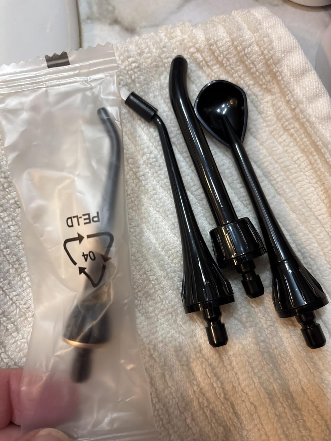 Customer photo review of COSLUS E40 10-Level Dial Pressure Control Water Flosser