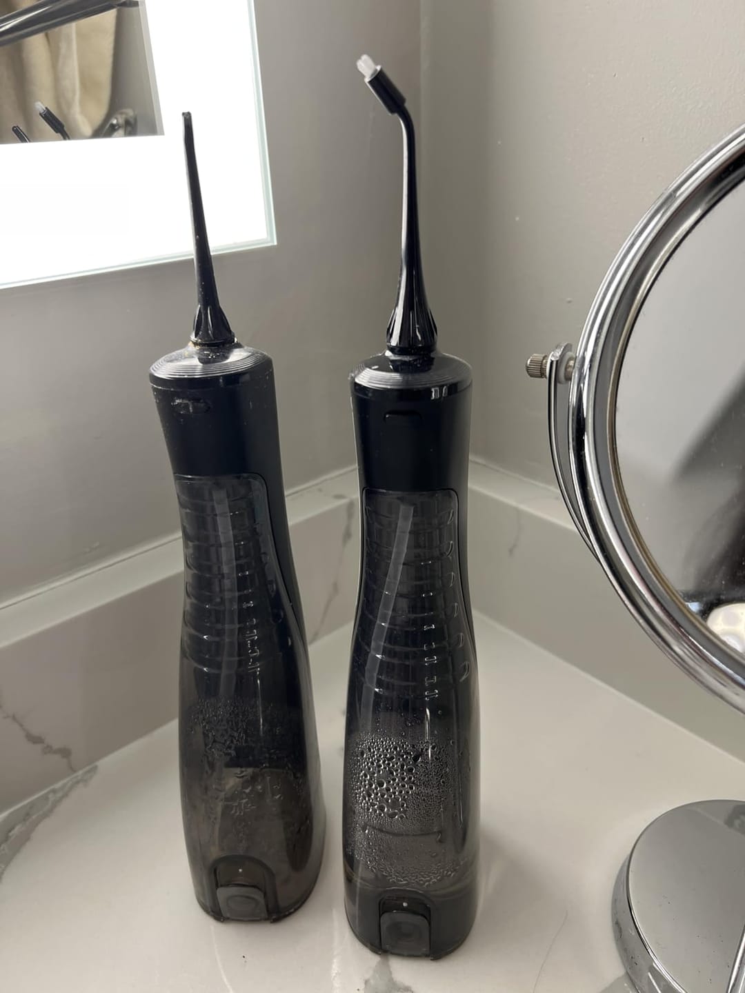 Customer photo review of COSLUS E40 10-Level Dial Pressure Control Water Flosser