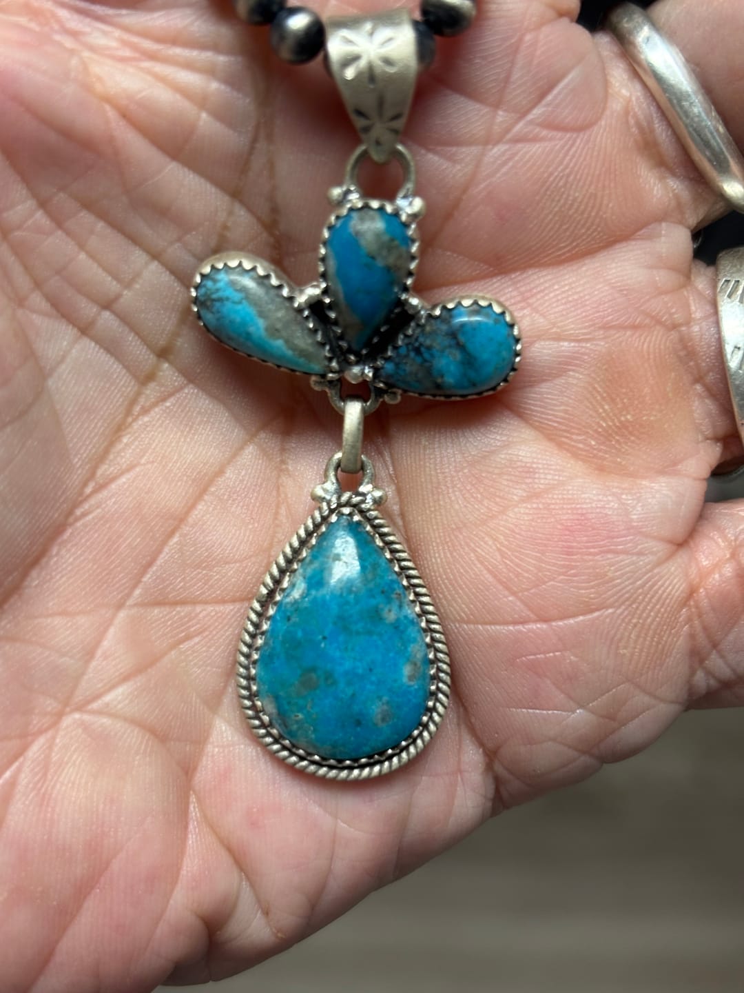 Customer photo review of Southwest Handmade Ithaca Peak Turquoise & Sterling Silver Pendants