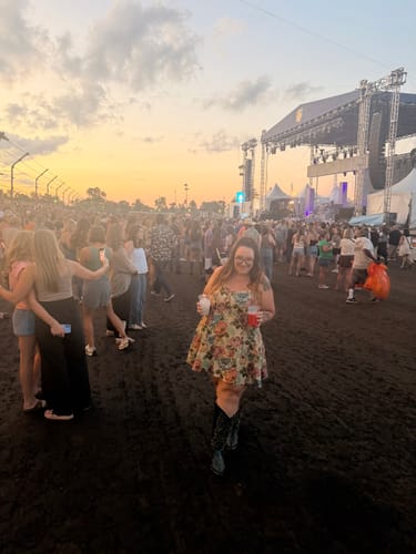 Customer's Blue & Green Jacquard Floral Print Tank Mini Dress worn at an outdoor festival.