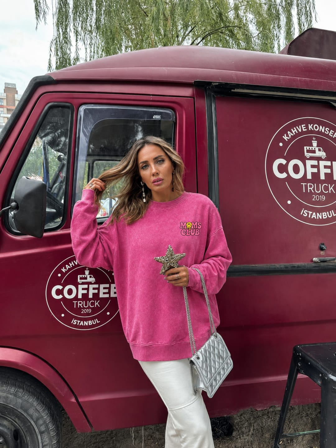 Customer photo review of Overstimulated Moms Club Washed Graphic Sweatshirt