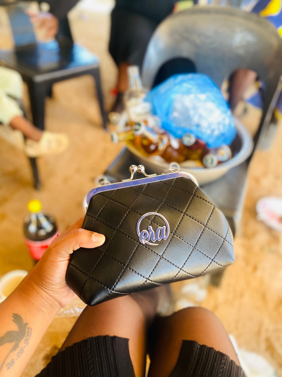 Customer photo review of ERA Mini Kisslock Chain Bag – Black