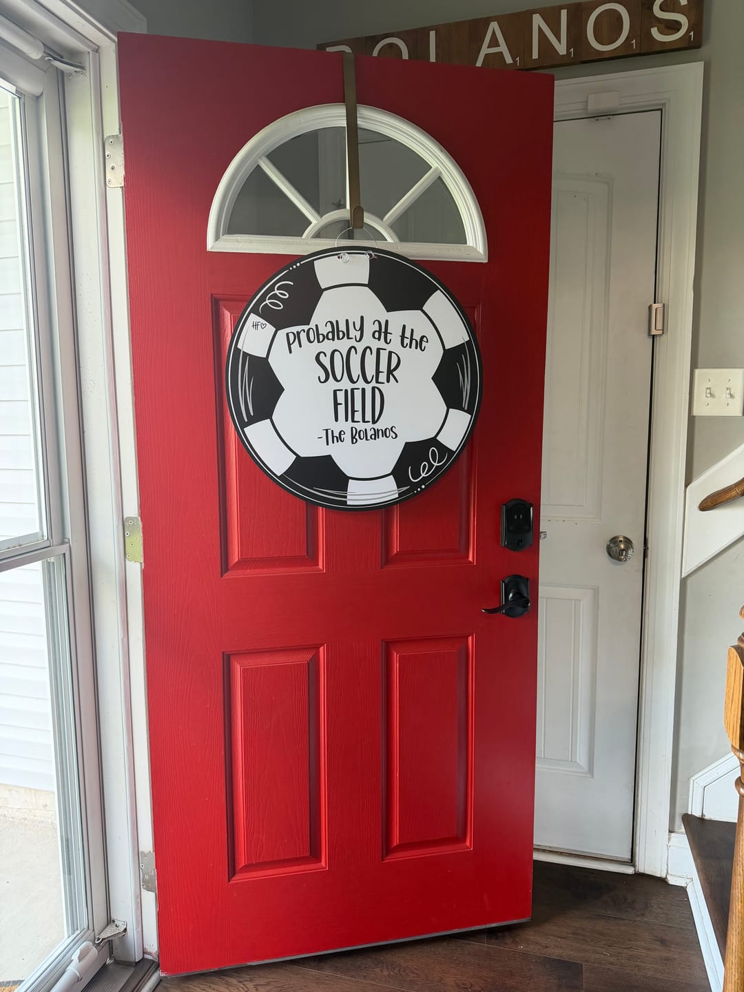 Customer photo review of Probably at the Soccer Field Custom Door Hanger