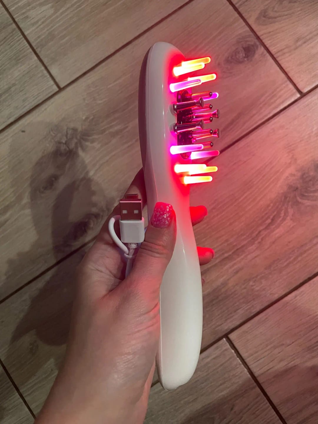 Customer photo review of Deluxe Electric Massage Comb with Oil Dispenser - Sonic Scalp Massager