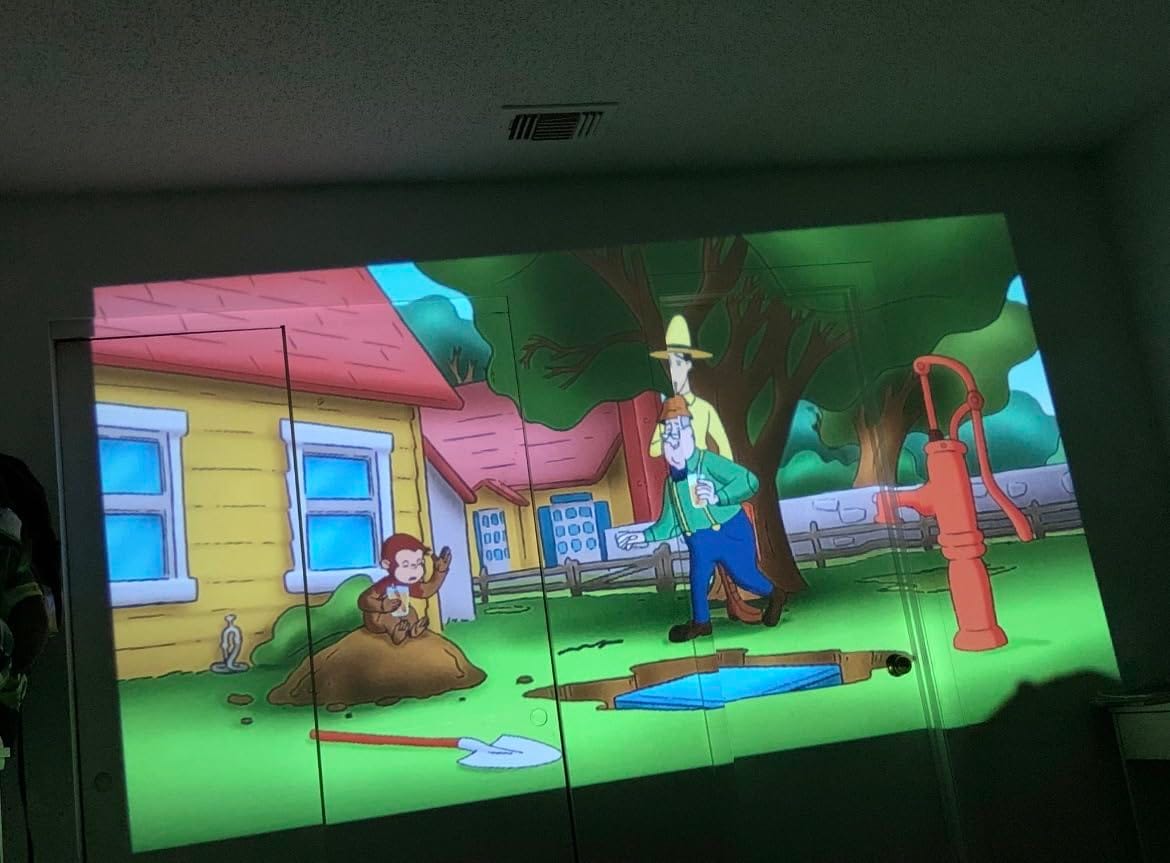 Customer photo review of BookBeam™ - Portable Book Projector