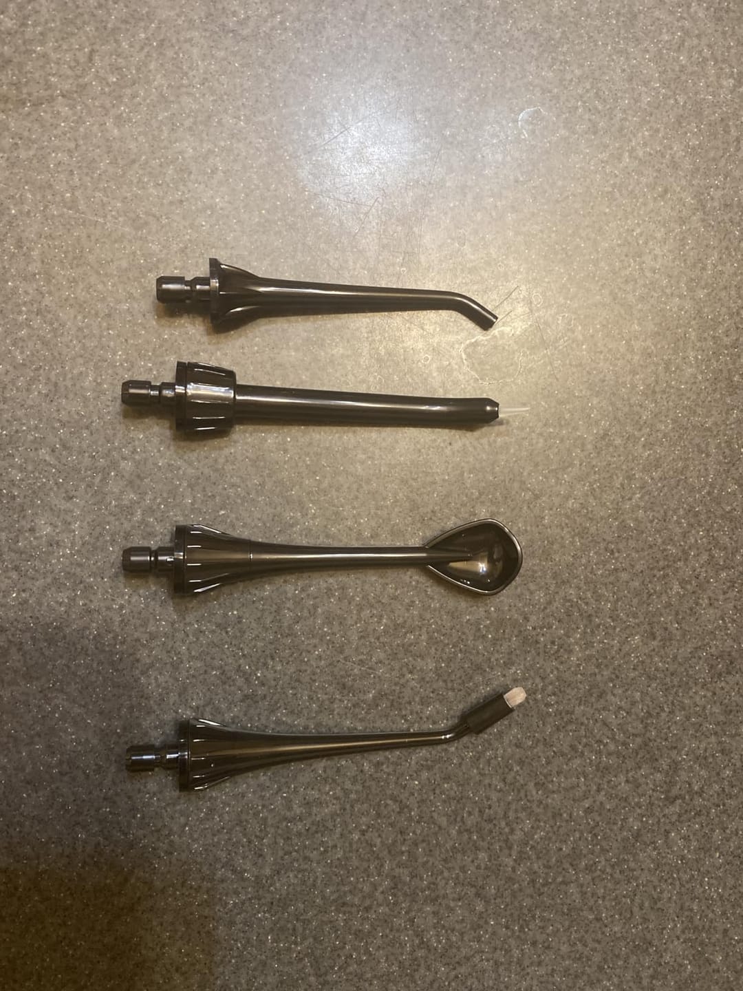 Customer photo review of COSLUS E40 10-Level Dial Pressure Control Water Flosser