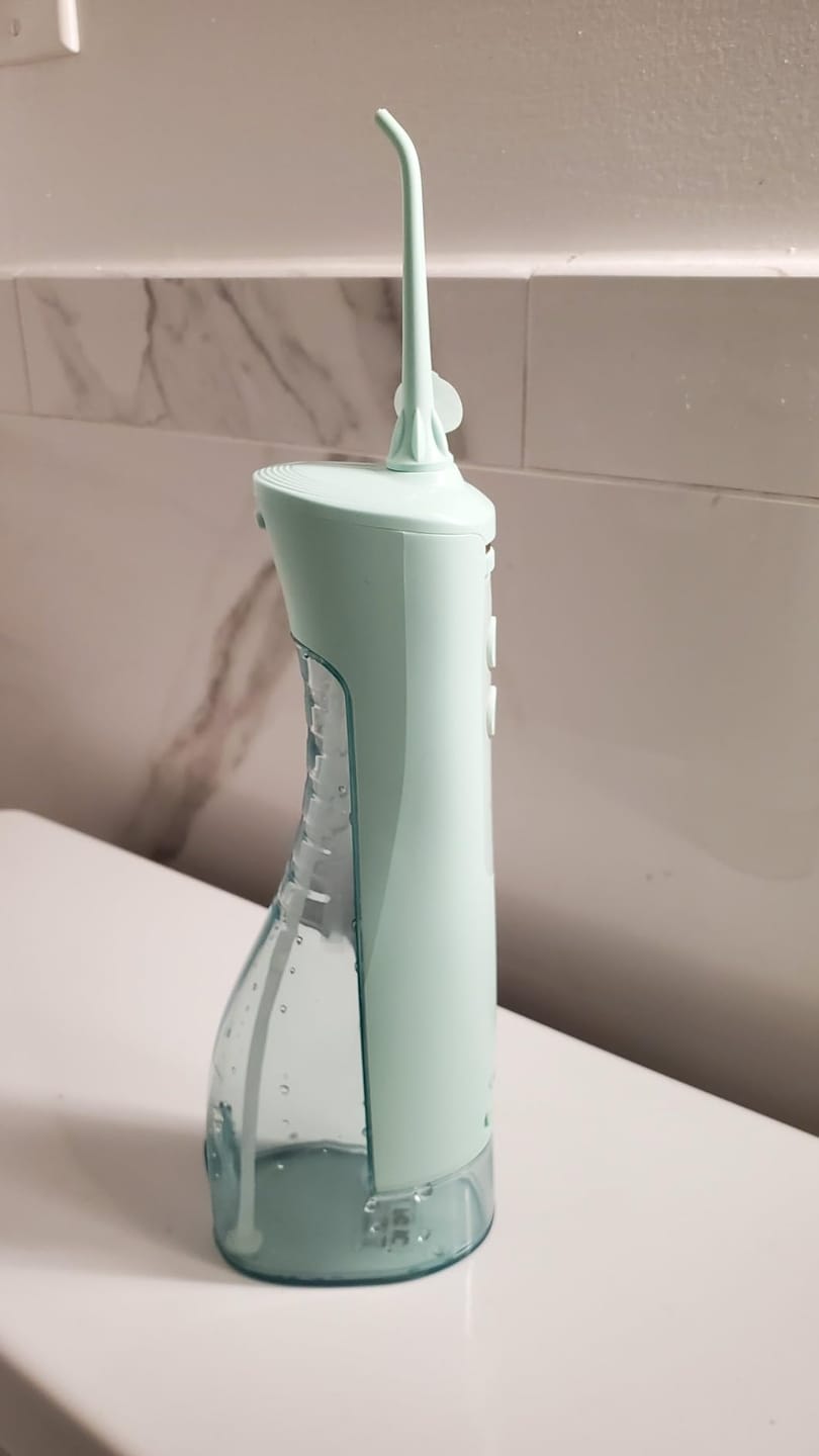 Customer photo review of COSLUS E40 10-Level Dial Pressure Control Water Flosser