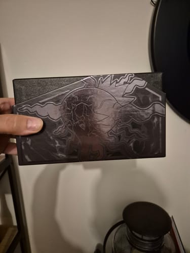 Customer photo review of Pokémon Mega Evolutions Pitch Black Elite Trainer Box