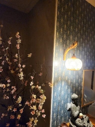 Customer photo review of Lámpara Decorativa de Pared en Bambú Tejido — Cable de Yute y Brazo de Madera