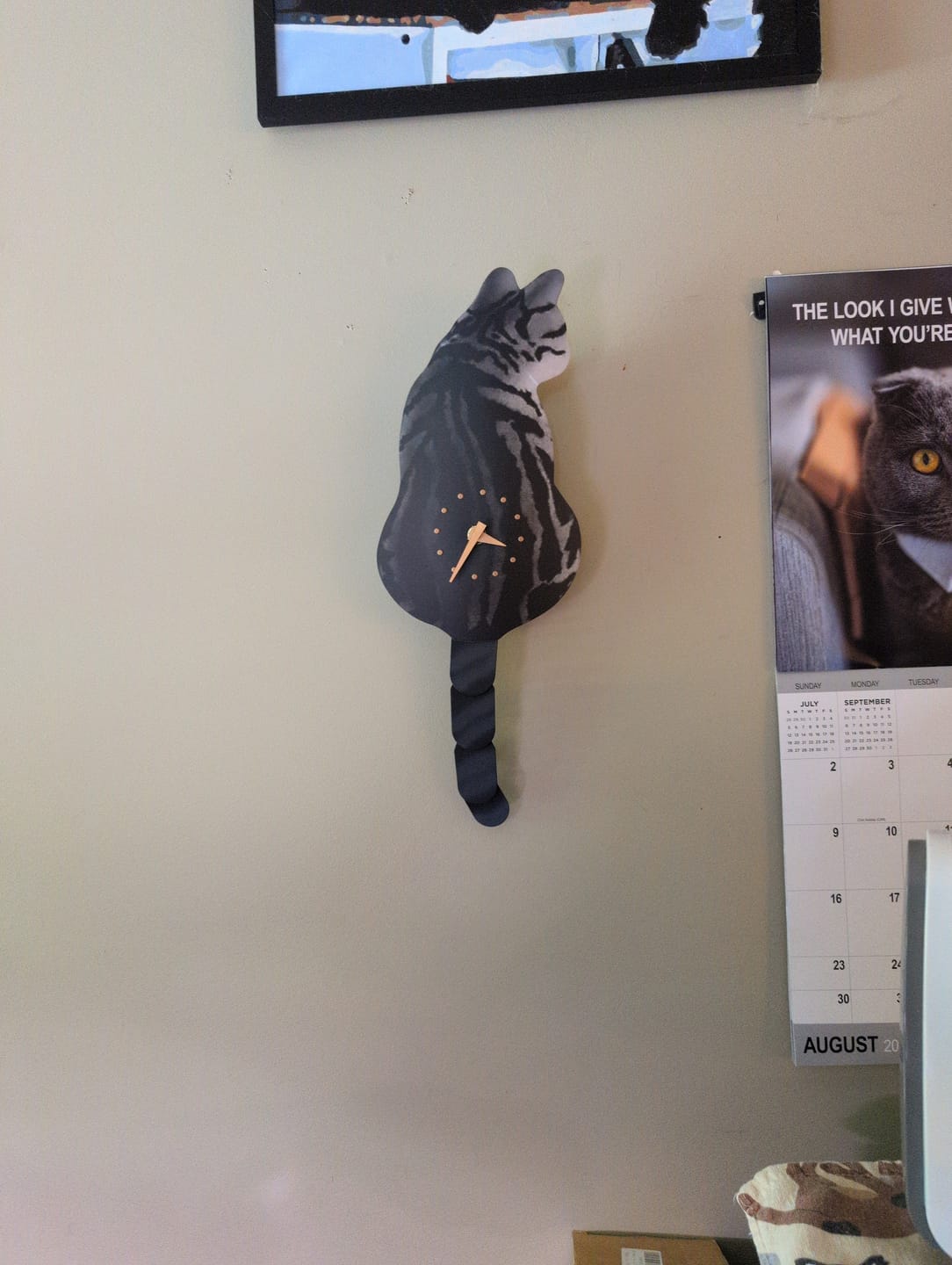 Customer photo review of Wag That Tail Cat Clock