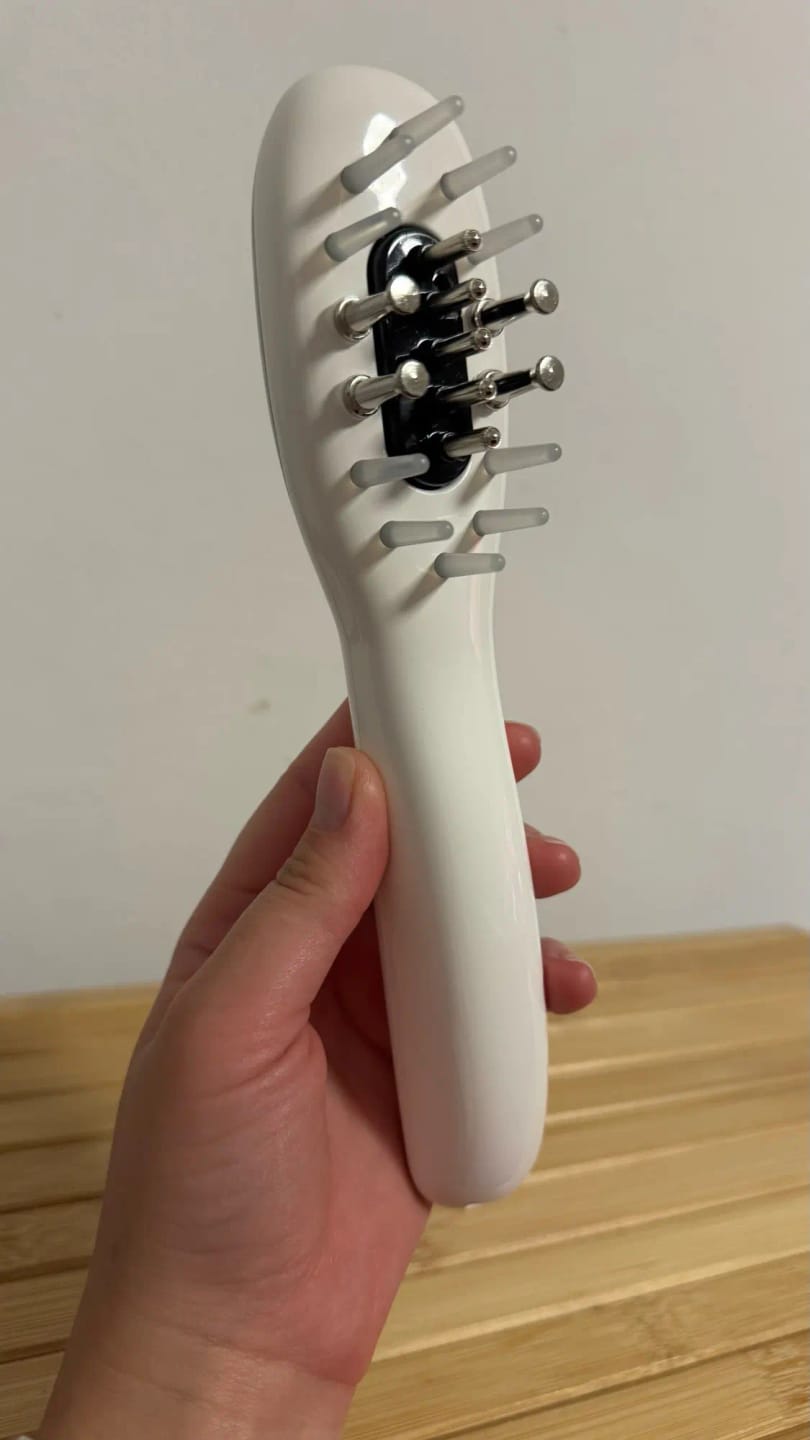 Customer photo review of Deluxe Electric Massage Comb with Oil Dispenser - Sonic Scalp Massager