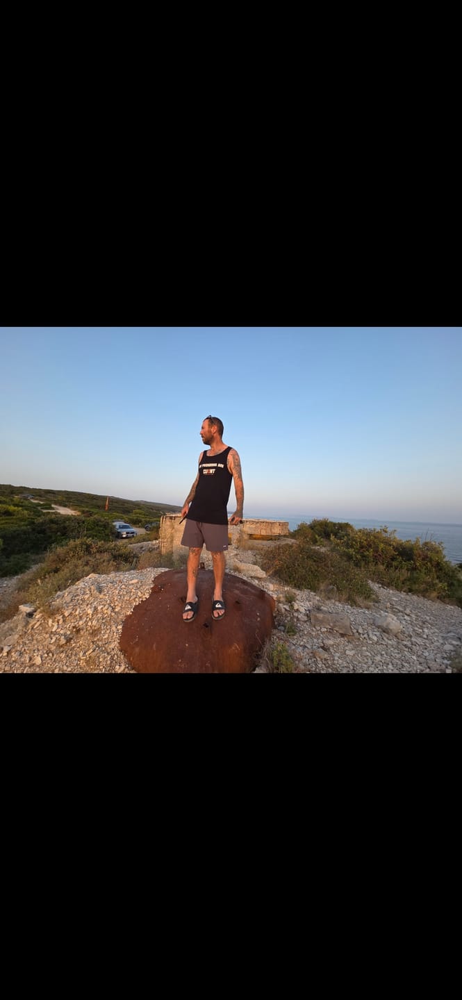 Customer photo review of Territory Pronouns Singlet Black