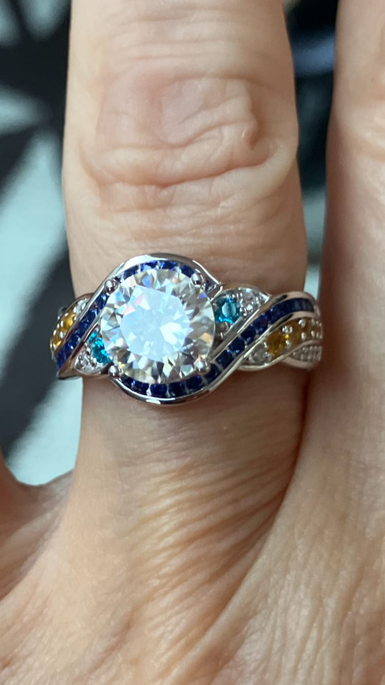 Customer photo review of Starry Night Moissanite Artistic Swirl Accent Engagement Ring