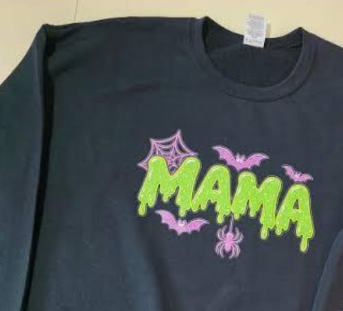 Customer photo review of Personalized Halloween Mama Glitter Embroidered Sweatshirt