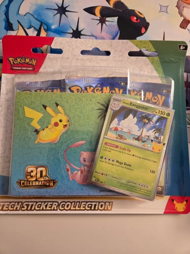 Customer's Pokemon 30th Celebration Tech Sticker Collection packaging featuring a promo card and booster packs.