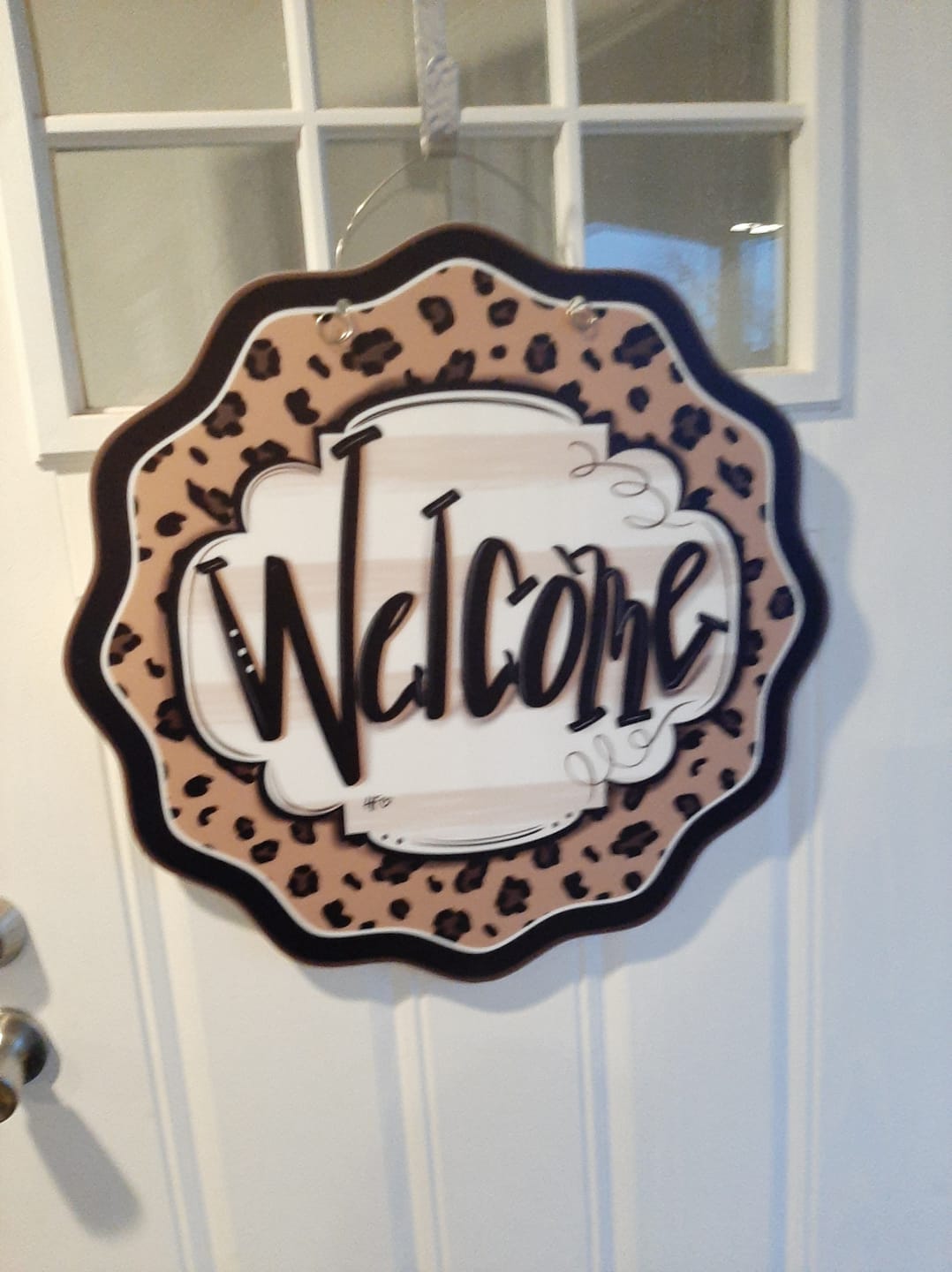 Customer photo review of Leopard Cheetah Welcome Door Hanger