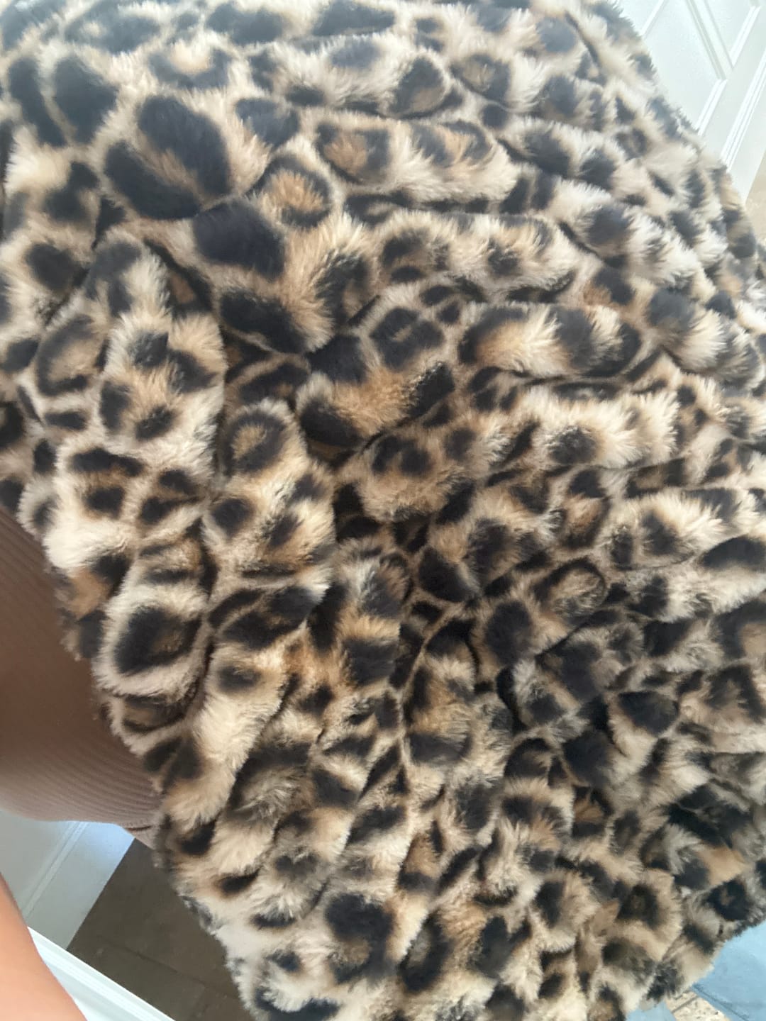 Customer photo review of Hugs Golden Leopard Blanket