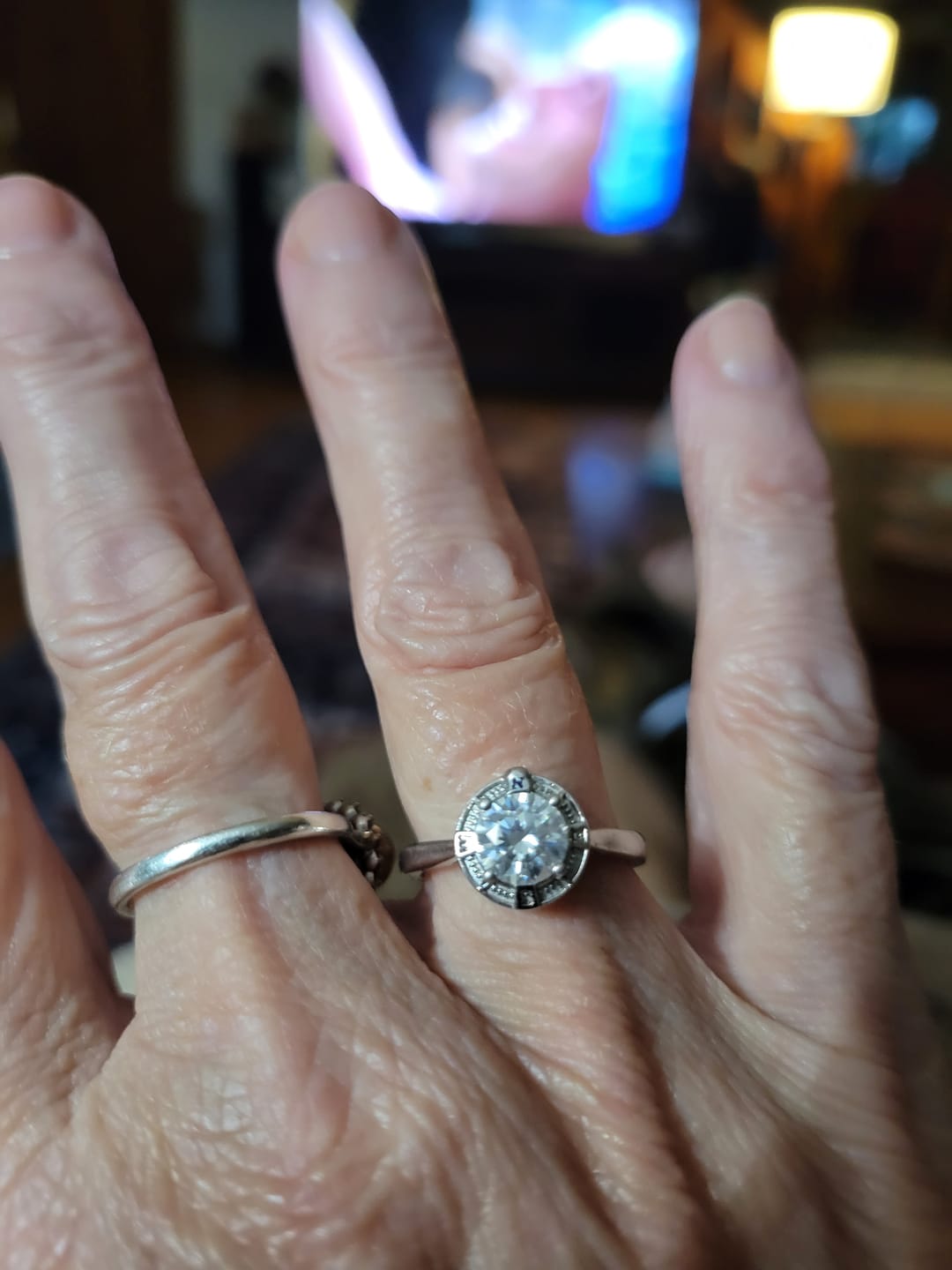 Customer photo review of North Star Halo Compass Solitaire Moissanite Engagement Ring