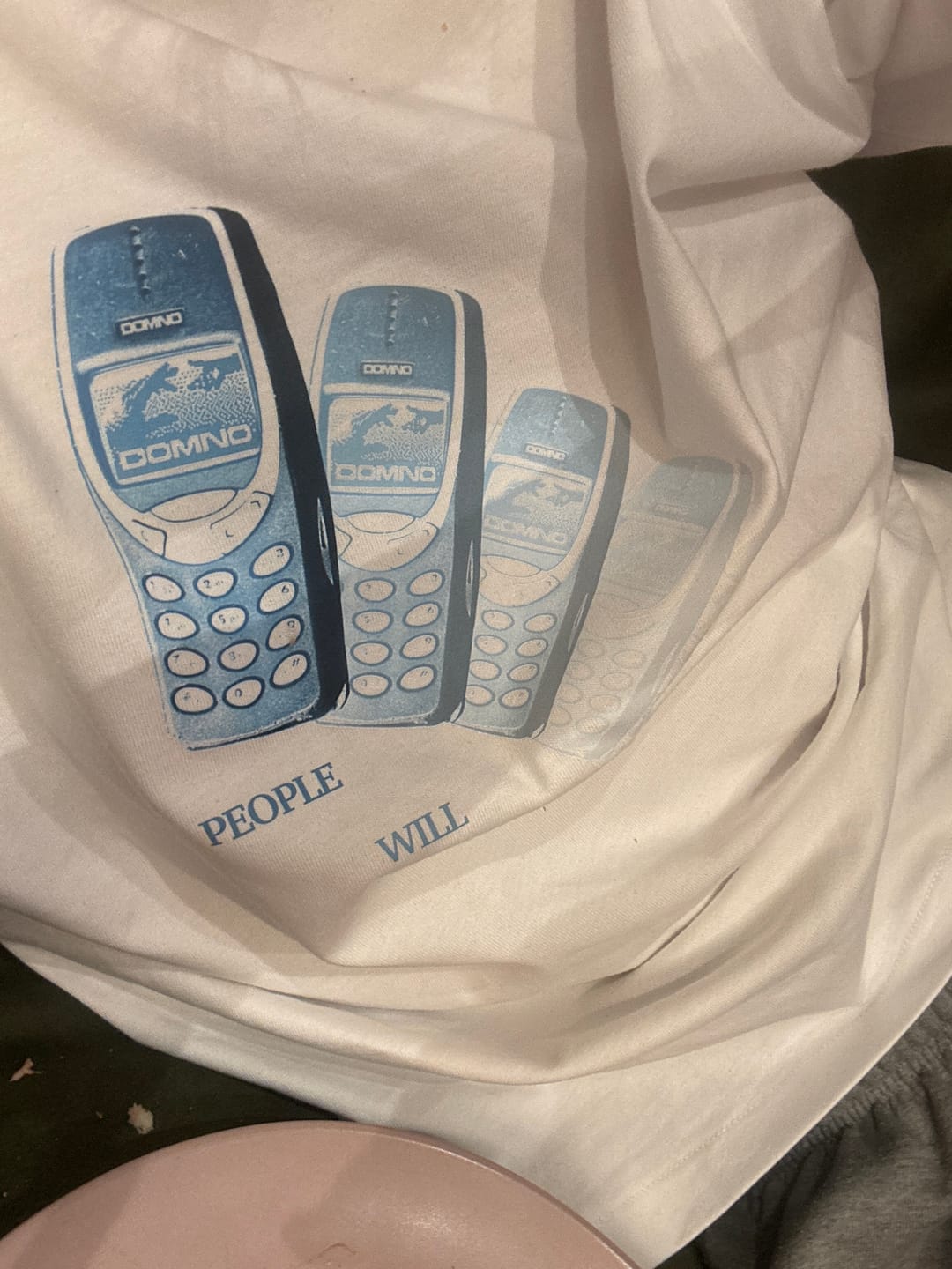 Customer photo review of People Will Talk Tee