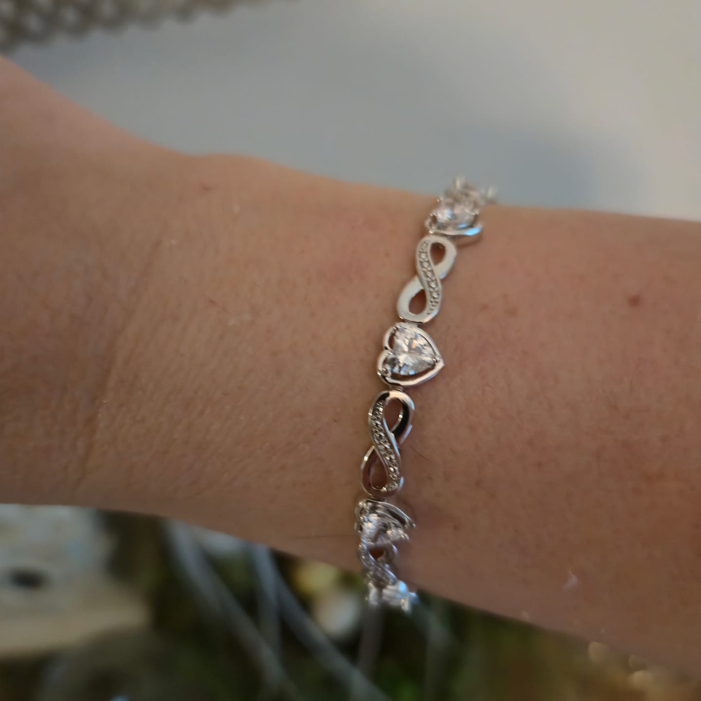 Customer photo review of Amanda 18k White Gold Plated Infinity Heart Tennis Bracelet with Simulated Diamond Crystals