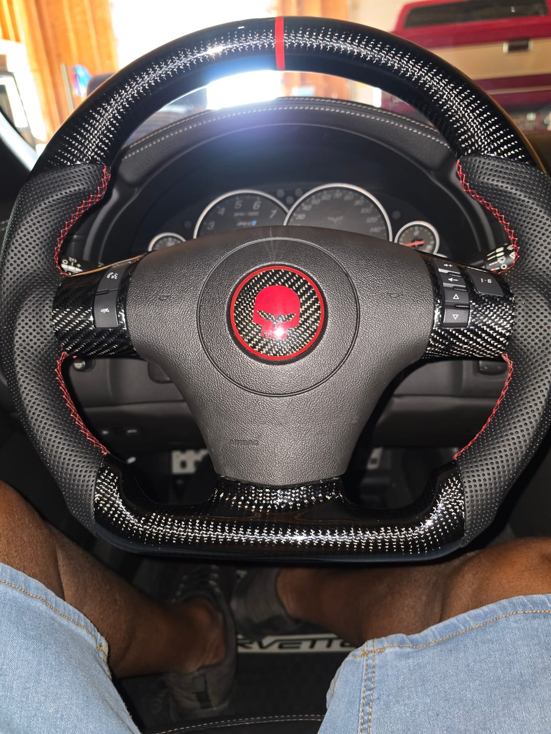 Customer photo review of Corvette C6 Dry Carbon Fiber Steering Wheel Button Control Bezel Covers