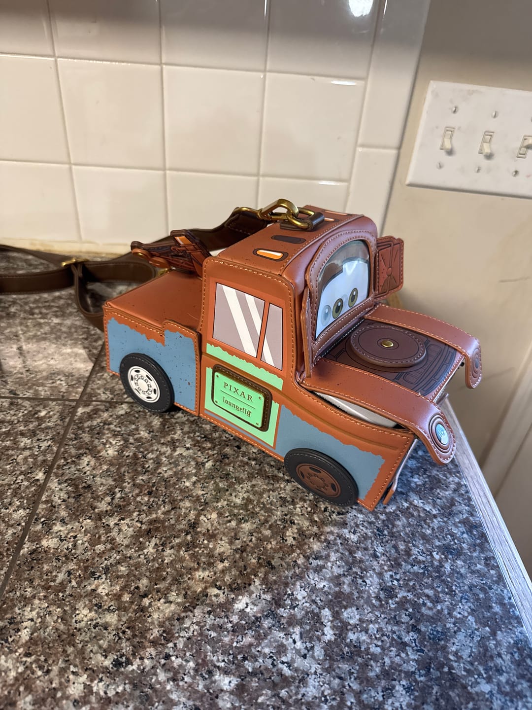 Customer photo review of Loungefly Disney Pixar Cars 20th Anniversary Tow Mater Figural Crossbody Bag