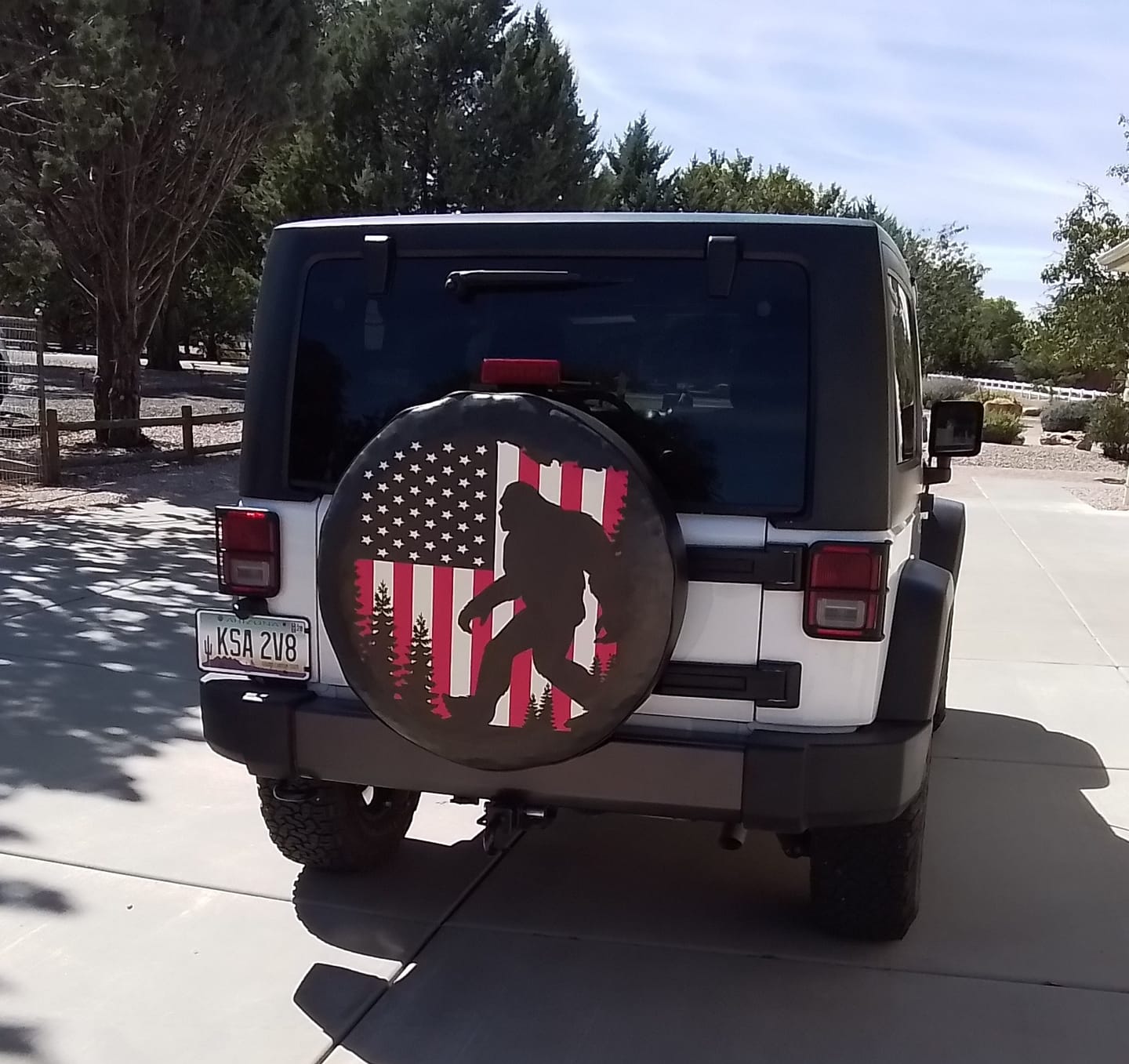 Customer photo review of Bigfoot or Sasquatch American Flag Spare Tire Cover for Bronco, Jeep, Camper, RV, & More